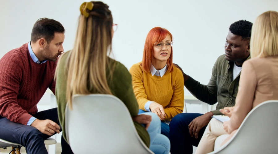Image of a group therapy session at South Shores Recovery, combining compassionate addiction treatment with optional faith-based support