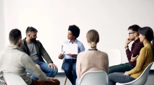 Image of men and women attending a Celebrate Recovery meeting - The 8 Principles of Celebrate Recovery - South Shores Recovery